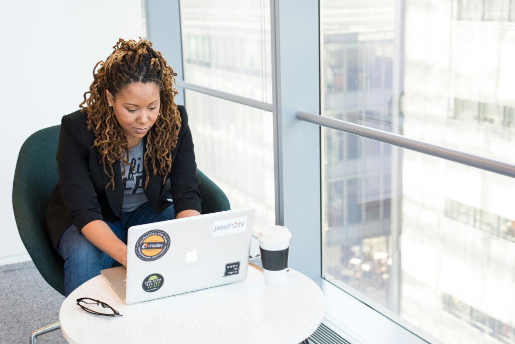 Entrepreneur working on finances on laptop